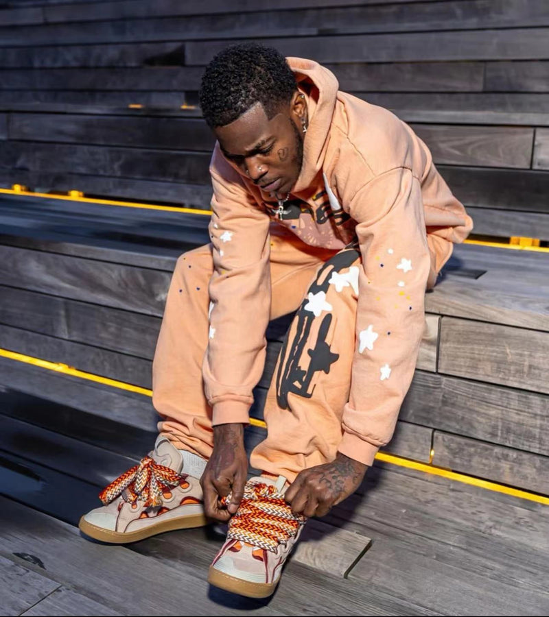 SP5DER Peach Hoodie – Bold Designer Streetwear with Web Graphic