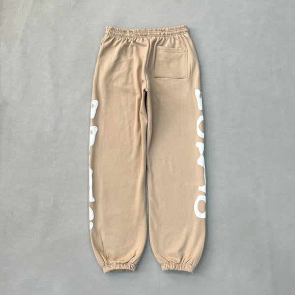 SP5DER Sand Beluga Pants – Neutral Streetwear Designer with Graphic Details